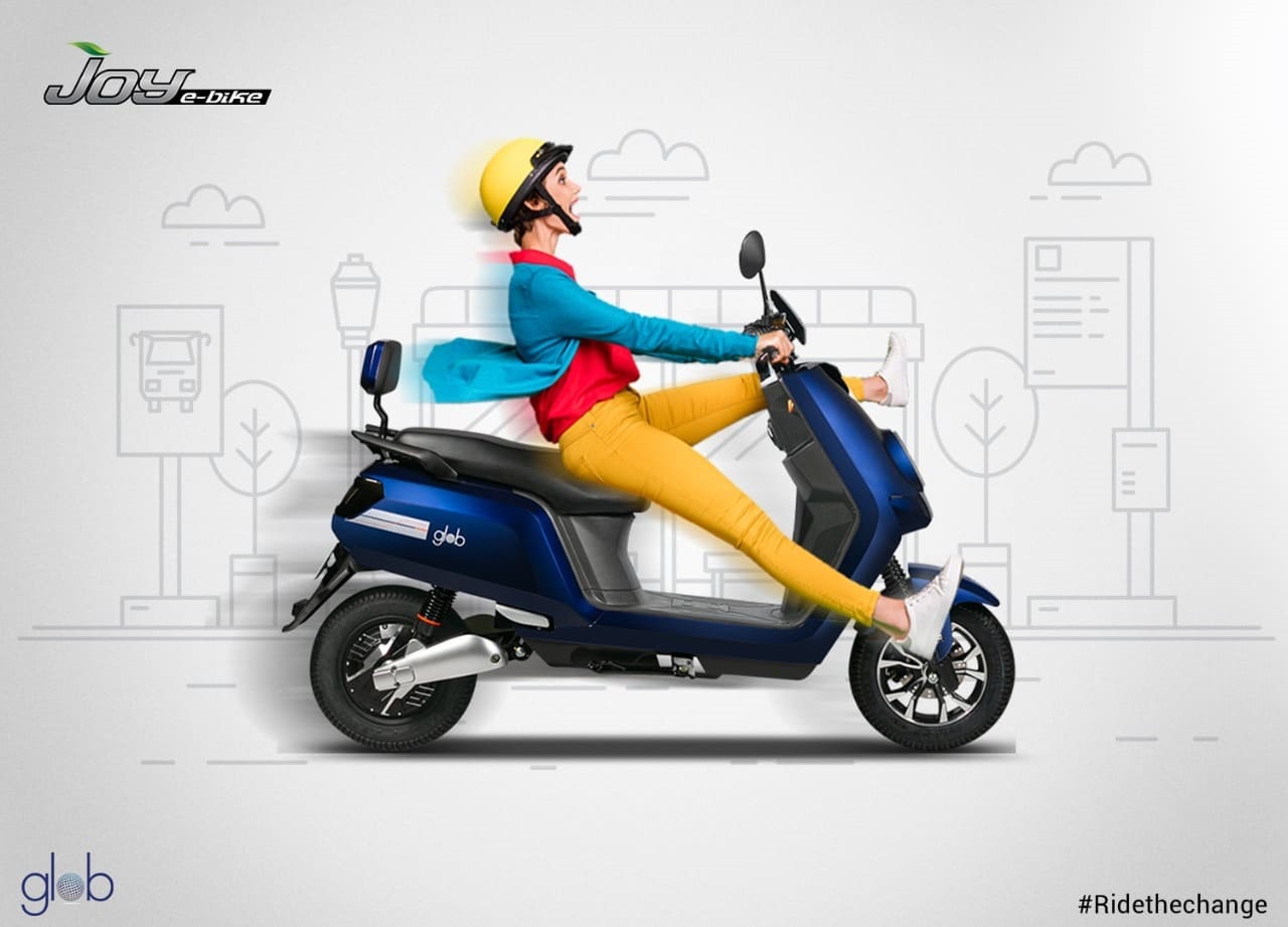 woman enjoy a ride on a scooter, highlighting the excitement of electric bikes compared to regular bike